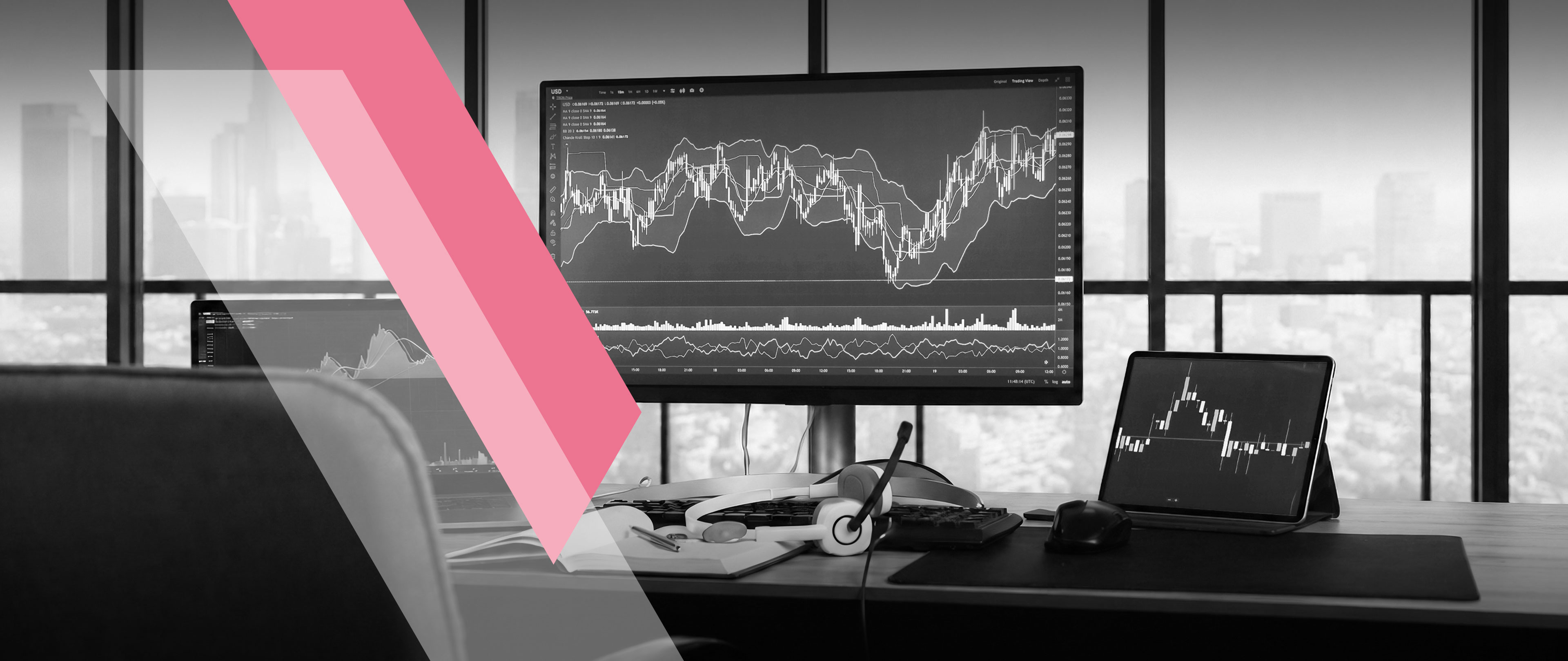 Portfolio manager at a trading desk above a city skyline